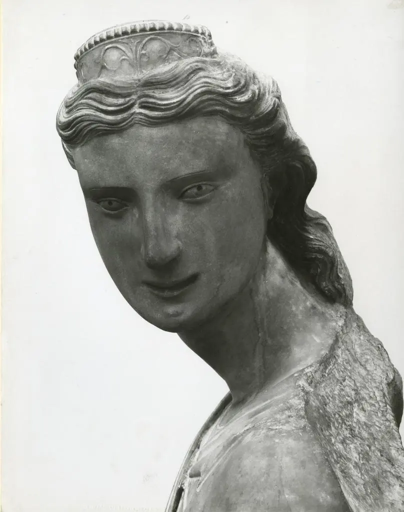 Anonimo , Anonimo fiorentino sec. XIV - Angelo reggicandelabro. Particolare del volto