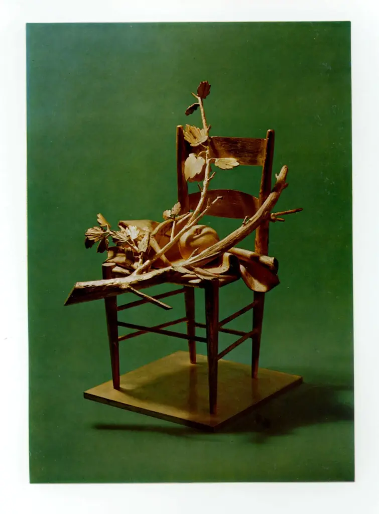 Anonimo , Manz&ugrave;, Giacomo - sec. XX - Seggiola e natura morta, in oro , fronte