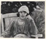 André, Albert , Jeune fille coiffée d'une toque blanche